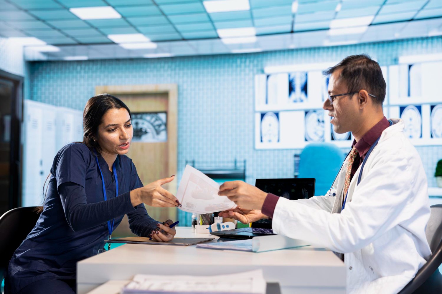 Medical billing services USA with doctors reviewing patient documents and healthcare billing information